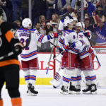 Rangers beat struggling Flyers 6-3 for 6th straight win
