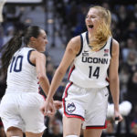 No. 9 UConn wins without Auriemma, topping Florida St 85-77