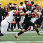 Maryland holds off No. 25 NC State in Duke's Mayo Bowl
