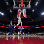 Embiid scores 53, leads 76ers to 131-113 win over Hornets