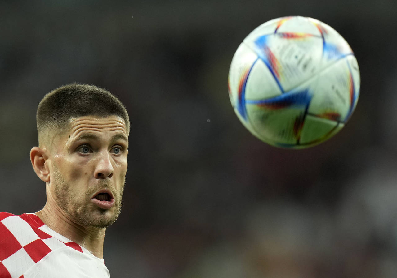 Croatia's Andrej Kramaric kicks the ball during the World Cup group F soccer match between Croatia ...