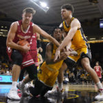 Wahl sparks Wisconsin to 78-75 victory over Iowa in overtime