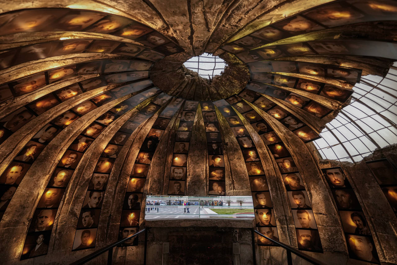 Portraits of victims of the communist rule decorate the ceiling of Bunk'Art2, an anti-nuclear shelt...