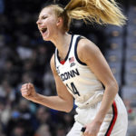 No. 9 UConn wins without Auriemma, topping Florida St 85-77