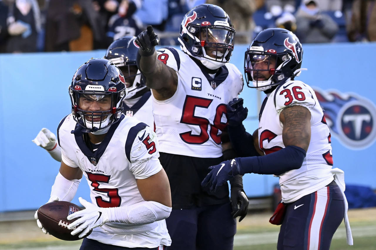 Houston Texans safety Jalen Pitre (5) celebrates after his interception on the last play of the gam...