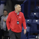 
              FILE - Gonzaga Athletic Director Chris Standiford walks along the court before an NCAA college basketball game between Gonzaga and Kent State, Monday, Dec. 5, 2022, in Spokane, Wash. The Zags are being talked about as a potential target for bigger conferences that once never would have looked toward Spokane. (AP Photo/Young Kwak, File)
            