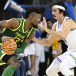No. 21 UCLA rallies late, hangs on to beat Oregon 65-56