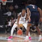 No. 13 Virginia beats Ga Tech, Bennett ties school wins mark
