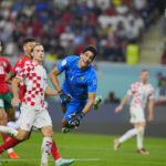 AP PHOTOS: World Cup highlights from Day 23