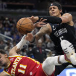 Magic beat Hawks 135-124 for 4th straight victory