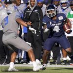 Henigan's three TD passes lead Memphis past Utah State 38-10