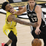 Vassell, Johnson help Spurs hold on to beat Jazz, 126-122