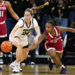 Clark scores 45, but No. 12 NC State tops No. 10 Iowa 94-81