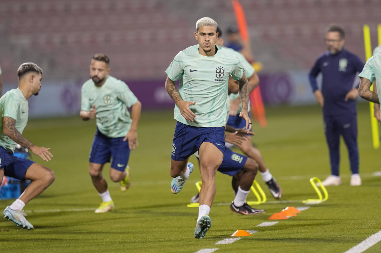 Brazil's Pedro exercises during a training session at the Grand Hamad stadium in Doha, Qatar, Thurs...