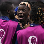 AP PHOTOS: World Cup highlights from Day 21