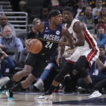 Butler's late flurry helps Heat put away Pacers 87-82
