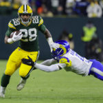 Packers defeat Rams 24-12 to keep playoff hopes alive