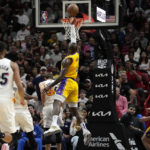 Heat get past Lakers 112-98, climb over .500 at 18-17