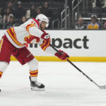 Kempe strikes in OT, Kings top Flames after giving away lead