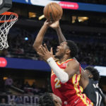 Magic beat Hawks 135-124 for 4th straight victory