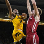 Wahl sparks Wisconsin to 78-75 victory over Iowa in overtime