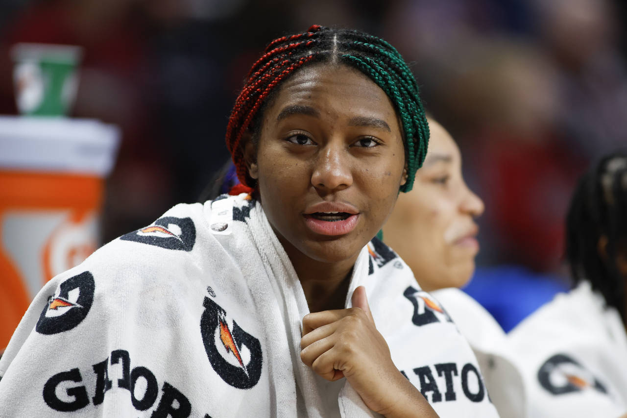 South Carolina forward Aliyah Boston watches from the bench during the fourth quarter of an NCAA co...