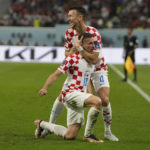 AP PHOTOS: World Cup highlights from Day 23