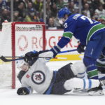 Winnipeg Jets hand Vancouver Canucks lopsided loss