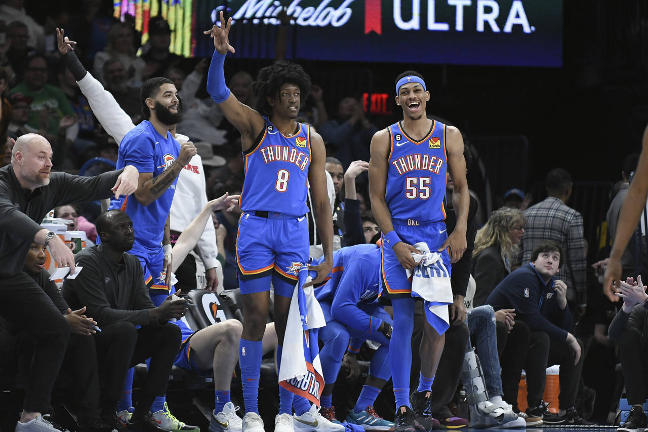 Oklahoma City Thunder forwards Jalen Williams (8) and Darius Bazley (55) celebrates in the first ha...