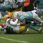 Tagovailoa throws 3 picks, Packers defeat Dolphins 26-20
