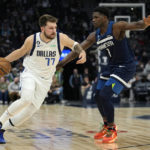 Doncic, Mavericks rebound to beat Timberwolves for split