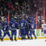 Pettersson scores early in OT, Canucks beat Canadiens 7-6