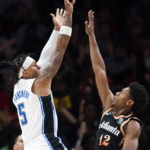 Murray hits winning free throws, Hawks end Magic's streak