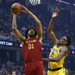Mitchell scores 41, Cavaliers rally to beat Pacers 118-112