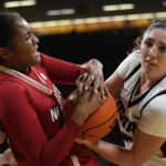 Clark scores 45, but No. 12 NC State tops No. 10 Iowa 94-81