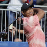 Woods and son hobble to a 59 and are 2 back of Team Thomas