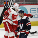 Orlov scores in OT, Caps hand Red Wings 6th straight loss