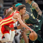 Young scores 31, Hawks hold off Ball, Hornets 125-106