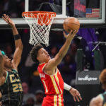 Young scores 31, Hawks hold off Ball, Hornets 125-106