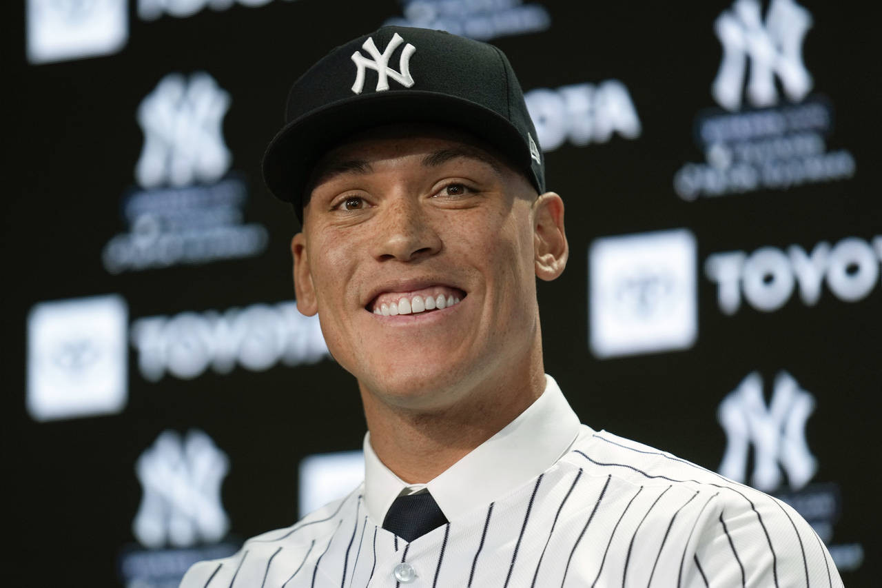 New York Yankees' Aaron Judge participates in a news conference at Yankee Stadium, Wednesday, Dec. ...