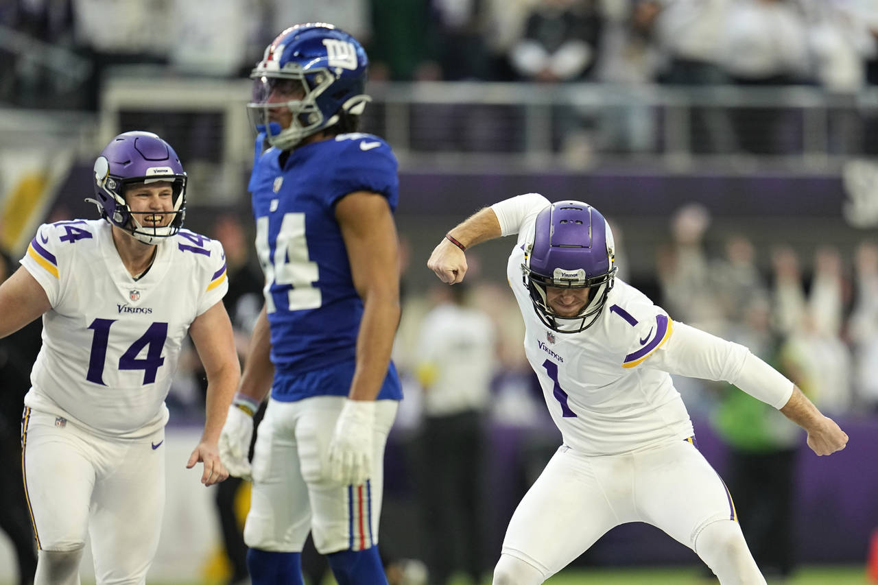 Minnesota Vikings place kicker Greg Joseph (1) celebrates in front of New York Giants cornerback Ni...