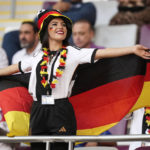 At World Cup, women fans shrug off worries over dress codes