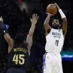 Nets push winning streak to 9 with 125-117 win over Cavs