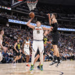 Jokic scores 31 in triple-double, Nuggets top depleted Jazz