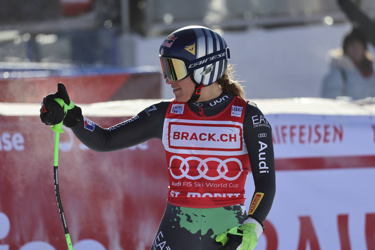 Italy's Sofia Goggia reacts after crossing the finish line to complete an alpine ski, women's World...