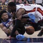 Butler's late flurry helps Heat put away Pacers 87-82