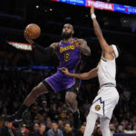 Davis injured, but LeBron leads Lakers past Denver 126-108