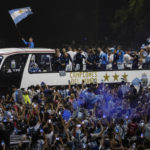 Sea of people try to catch glimpse of Argentina soccer team