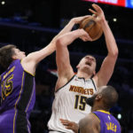 Davis injured, but LeBron leads Lakers past Denver 126-108