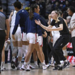 No. 9 UConn wins without Auriemma, topping Florida St 85-77